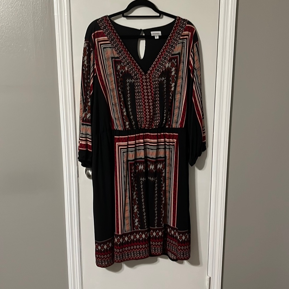 Black dress with red geometric pattern